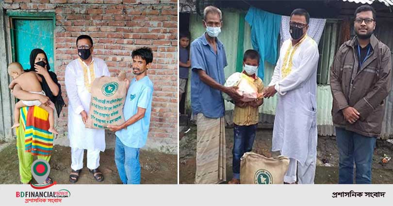 শিশুর জন্য দুধ কিনতে না পারা বাবা এবং কলা বিক্রি করা শিশুর পরিবারের পাশে বরিশাল জেলা প্রশাসক